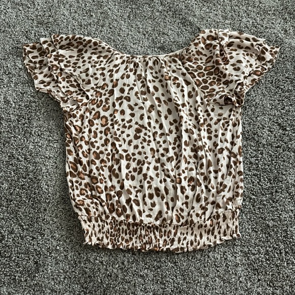 Size small Express brand blouse. Cheetah. Very flattering. V-Neck - Picture 2 of 2